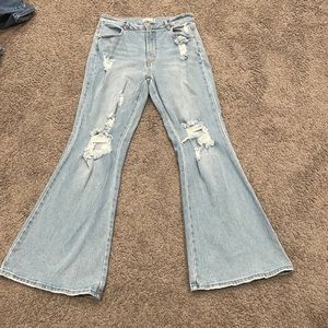 Blue ripped flared jeans